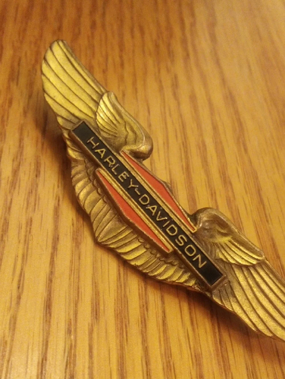 Harley-Davidson Gold Winged Logo Pin with Black and Red Accents